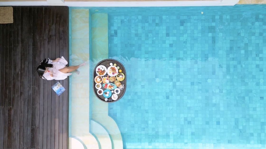 A floating breakfast set on the villa pool