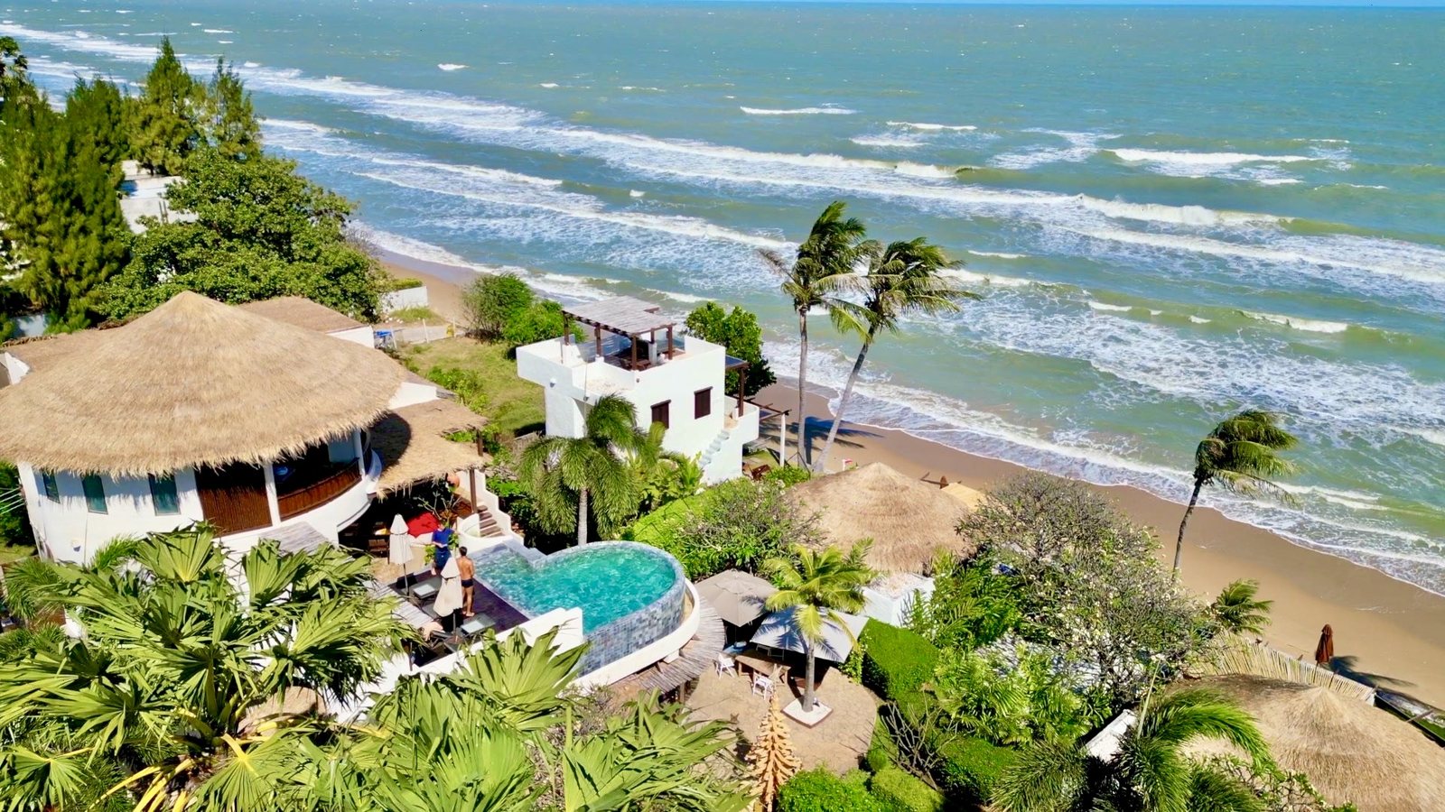 Aleenta Hua Hin — aerial of the beachfront resort by the Gulf of Thailand