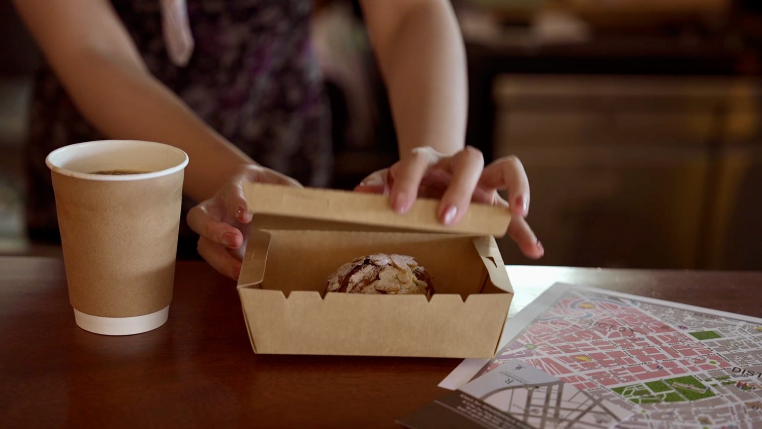 Coffee and a pastry to take into the city, with a Saigon map